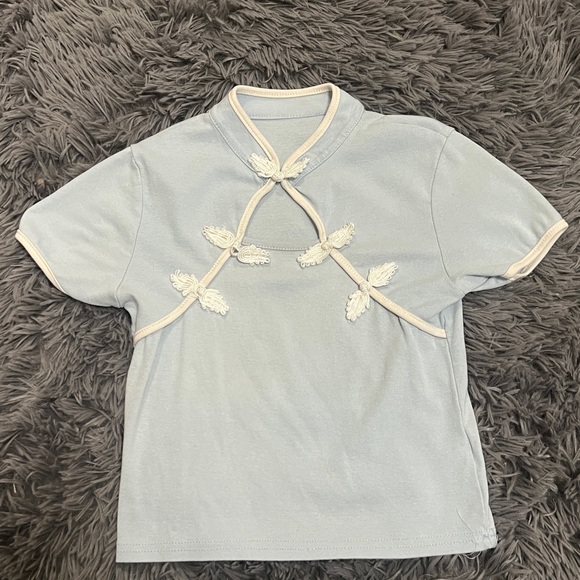 ✨3/$20✨ Chinese style hallow out short sleeve top in baby blue - Picture 1 of 2